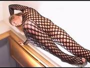 Mature Renata in fishnets on the stairs