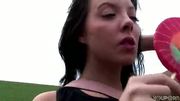 Teenie Delma strips down in the grass