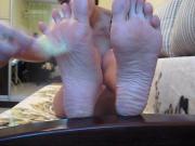 Foot Fetish Chick uses Feather on her own Bare Soles