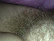 thick hairy pussy under the sheets.