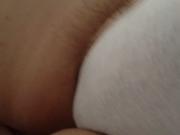 pubic hair sticking out of the sides of her white pantys.