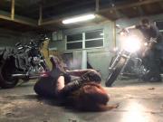 Biker girl hogtied in the garage