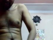 Indian guy wanking and cumming with a shaving brush