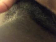 Hairy black pussy pissing