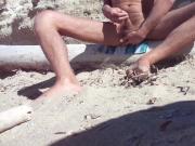 wanking and cumming on an empty beach