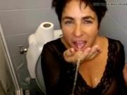 A hot milf get piss on in toilet