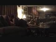 Makingout while husband sit across