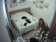 Super sexy women undresing in her bedroom