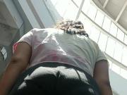 A Chubby teen on the scalator of mall