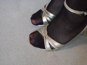 Feet in RT Fishnet Pantyhose & High Heels Close Up