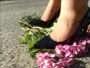 Wife crush flowers in black pointy heels