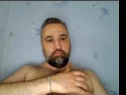 hairy beard guy plays with his nipples