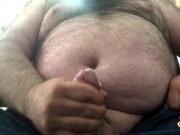 Fat man jerks cock and cums