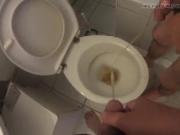 2 guy pissing in the toilet