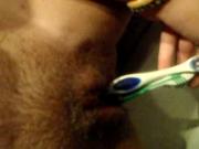she masturbates with a toothbrush