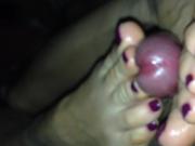 Purple nail polish and footjob.