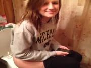 Cute girls peeing on the Toilet