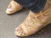 Candid ebony feet on the train