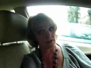 Mature wife gives good suck to man on car