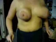 Big pierced tits runs on a treadmill