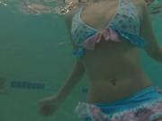 Little teen caught swimming in bikini