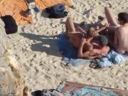 Group of guys having sex on the beach