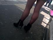Slow motion woman with high heels and pantyhose waiting