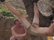 Assfucked sub twink hanging from a tree and getting punished