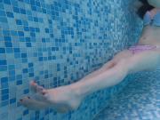 Underwater feet in waterpark