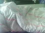 Horny girl masturbating and pissing in bed