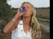 Blond slag pissing outside 2 with piss drink