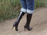 Girl walk in high boots in mud!