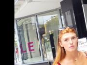 Candid voyeur gorgeous redhead model in skirt shopping