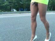 Public road walk in yellow micro mini skirt .