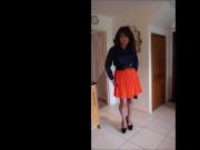 Orange pleated skirt