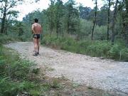 guy jerking in forest