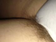 close up of the wifes pubic hair hainging from her panties