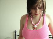 Luisa shows off her natural titties to the camera in pink high heels