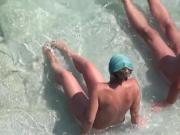 Horny Nudist wife teasing and jerking husbands cock at beach