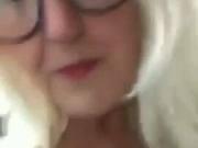 Granny in glasses squirts using anal plug