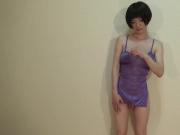 crossdresser in a purple lingerie