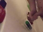 Jerking off in shower razor handle in ass