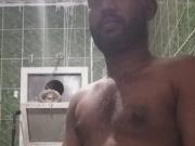 Masturbating