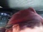 Red haired girl gives pov blowjob in the car