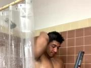 Cute colombian beefy guy flexing & showing off in shower