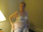 Aunt Sue undresses for intercourse