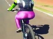 Shiny lycra sexy women in bike
