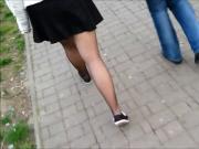 Sheer black pantyhose candid legs.