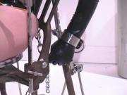 Latex girl uses vibrator while she gets fucked by a sex machine