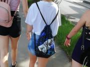 Candid Teen Walking in Black Shorts on the Street City 2